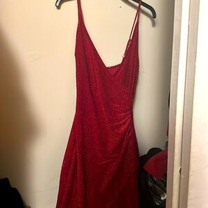 Red dress with leg slit, inside of dress is somewhat itchy